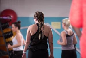 sporty women doing aerobics exercises photo