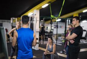 athletes getting instructions from trainer photo