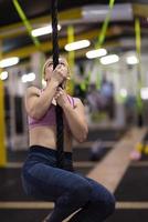 woman doing rope climbing photo