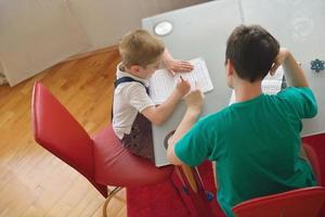 Boy doing homework photo