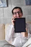 woman using tablet pc at home photo