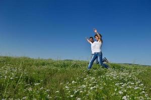 happy couple in wheat field photo