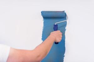 Decorator's hand painting wall photo