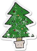 distressed sticker of a cartoon christmas tree vector