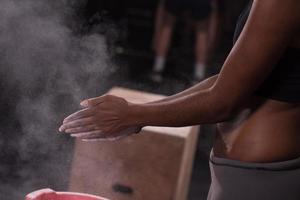 black woman preparing for climbing workout photo