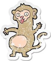 retro distressed sticker of a funny cartoon monkey vector