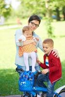 happy young family in park photo