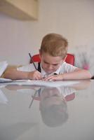 Boy doing homework photo