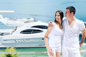 young couple on yacht photo