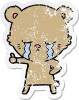distressed sticker of a crying cartoon bear giving thumbs up vector