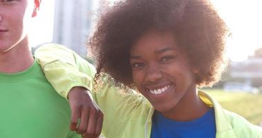 Portrait of multiethnic group of young people on the jogging photo