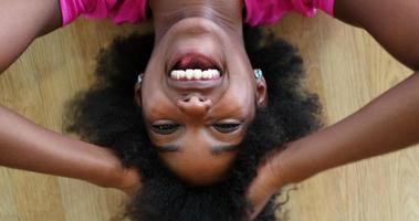 portrait of young afro american woman in gym on workout break photo