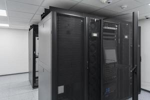 Data Center With Multiple Rows of Fully Operational Server Racks. Modern Telecommunications, Cloud Computing, Artificial Intelligence, Database, Supercomputer Technology Concept. photo