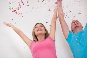 romantic young  couple celebrating  party with confetti photo