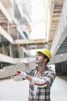 hard worker on construction site photo