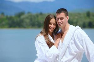 young couple on yacht photo