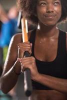 black woman after workout with hammer photo