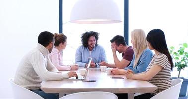 Startup Business Team At A Meeting at modern office building photo