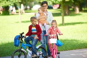 happy young family in park photo