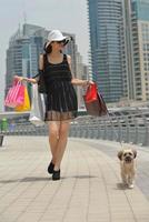 beautiful woman goes in shopping photo