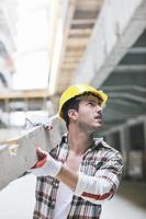 hard worker on construction site photo