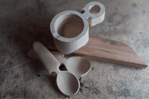 Handmade Wooden Spoons for hiking and outdoor activities. Craftsmanship and artisan concept photo