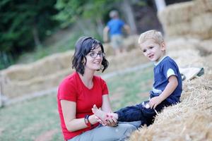 woman and child have fun outdoor photo