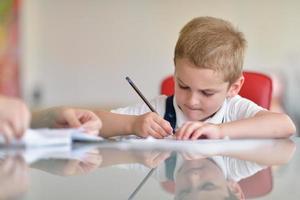 Boy doing homework photo