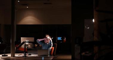 businessman relaxing at the desk photo