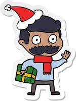 sticker cartoon of a man with mustache and christmas present wearing santa hat vector