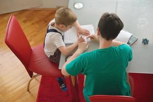 Boy doing homework photo