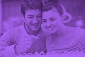 happy young couple in jewelry store photo