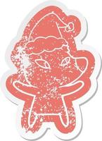 cute cartoon distressed sticker of a bear wearing santa hat vector