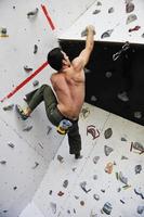 Man rock climbing photo