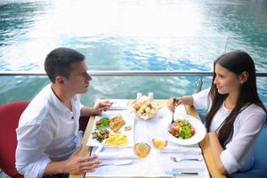 couple having lanch at beautiful restaurant photo