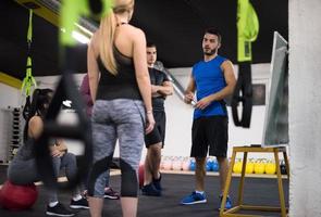 athletes getting instructions from trainer photo