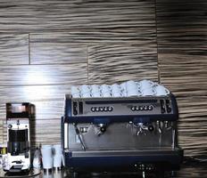 Coffee machine on table photo