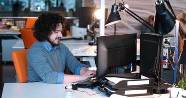 businessman working using a computer in startup office photo