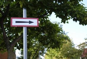 Directional sign with arrow pointing to the right