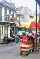 New Orleans, LA, 2020 - Street scene in the French Quarter of New Orleans, Louisiana, with the higher downtown buildings in the background. photo