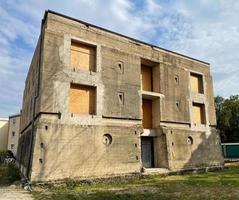 unfinished bunker conversion into apartment building photo