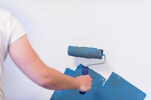 Decorator's hand painting wall photo