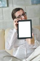 woman using tablet pc at home photo