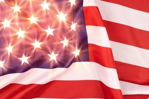 Glowing stars on USA flag, patriotic symbol of America photo