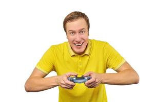 Funny gamer with gamepad, excited video game player concept isolated on white background photo