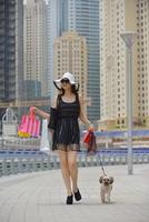 beautiful woman goes in shopping photo