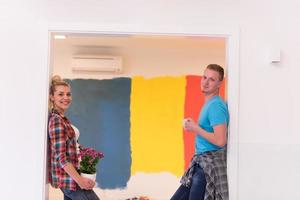 multiethnic couple renovating their home photo