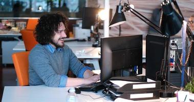 businessman working using a computer in startup office photo