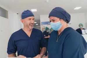 orthopedic doctor working together with his multiethnic team photo