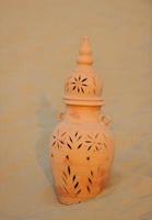 arabic pot in sand photo
